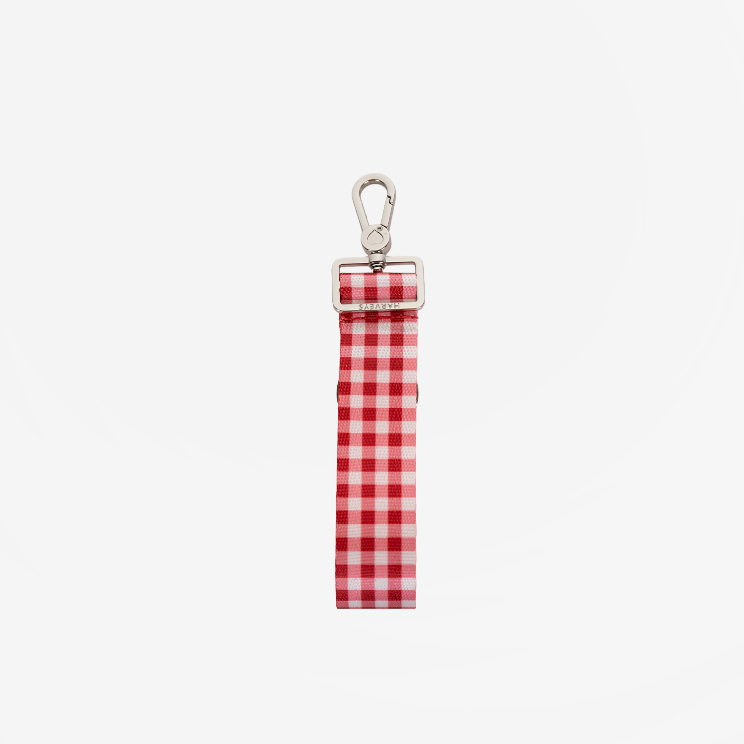 The back of a 4 Panel Keychain in Red Gingham