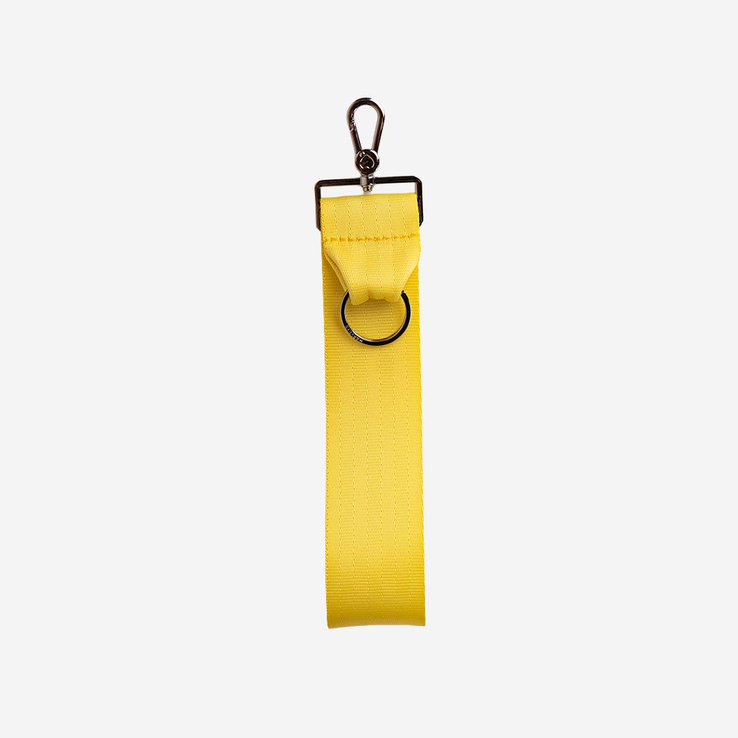 The front view of a 5 Panel Keychain in Lemon
