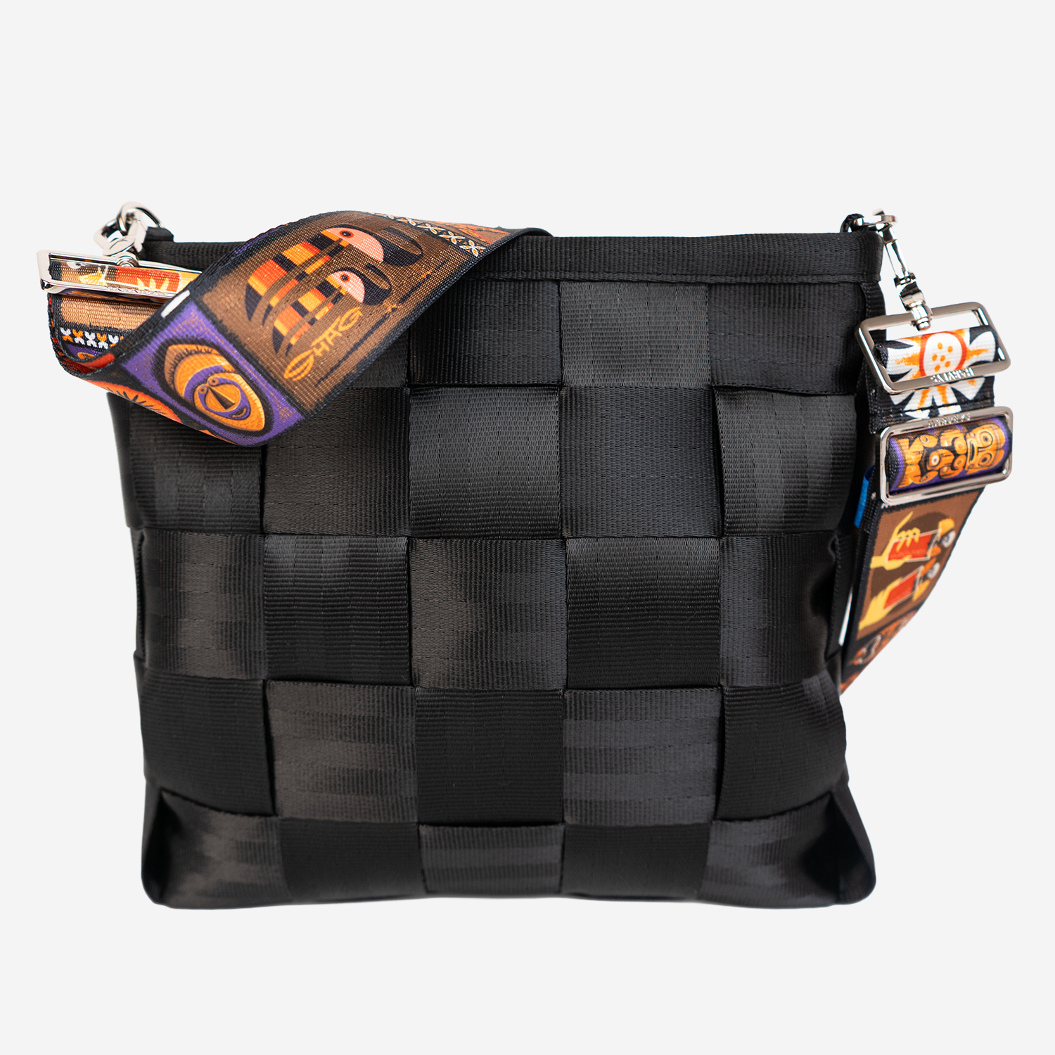 The Shag Tiki Tapa 5 Panel Click N Carry being used on a bag
