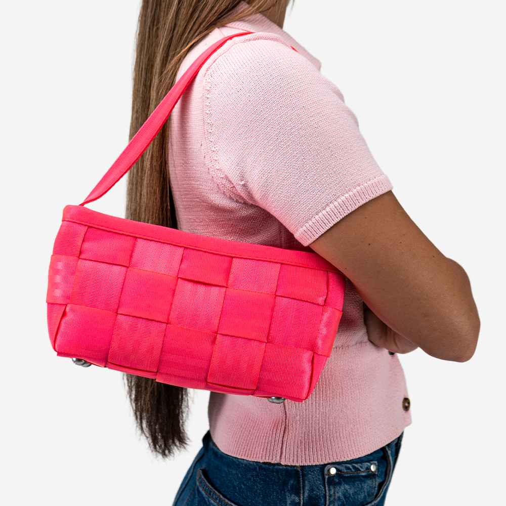 The Baguette in Dragonfruit being worn by a model