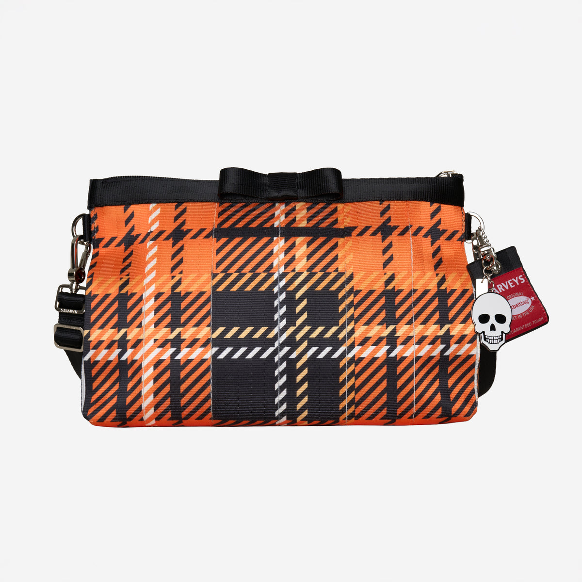Front view of Bow Clutch in orange tartan