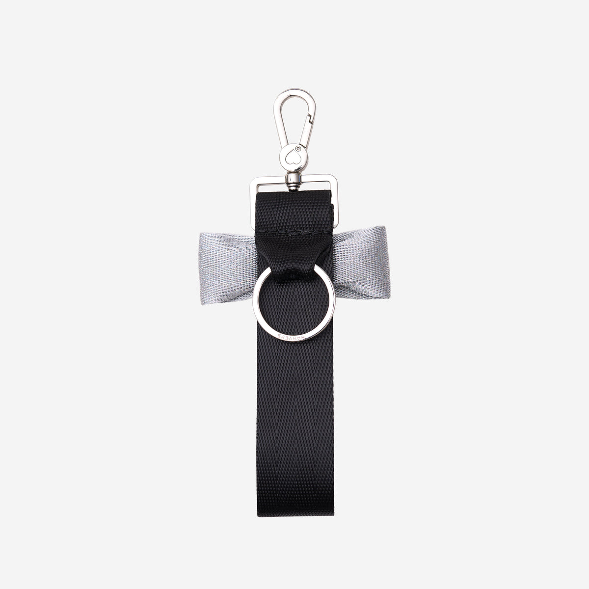The back of a Black and Silver Bow Keychain