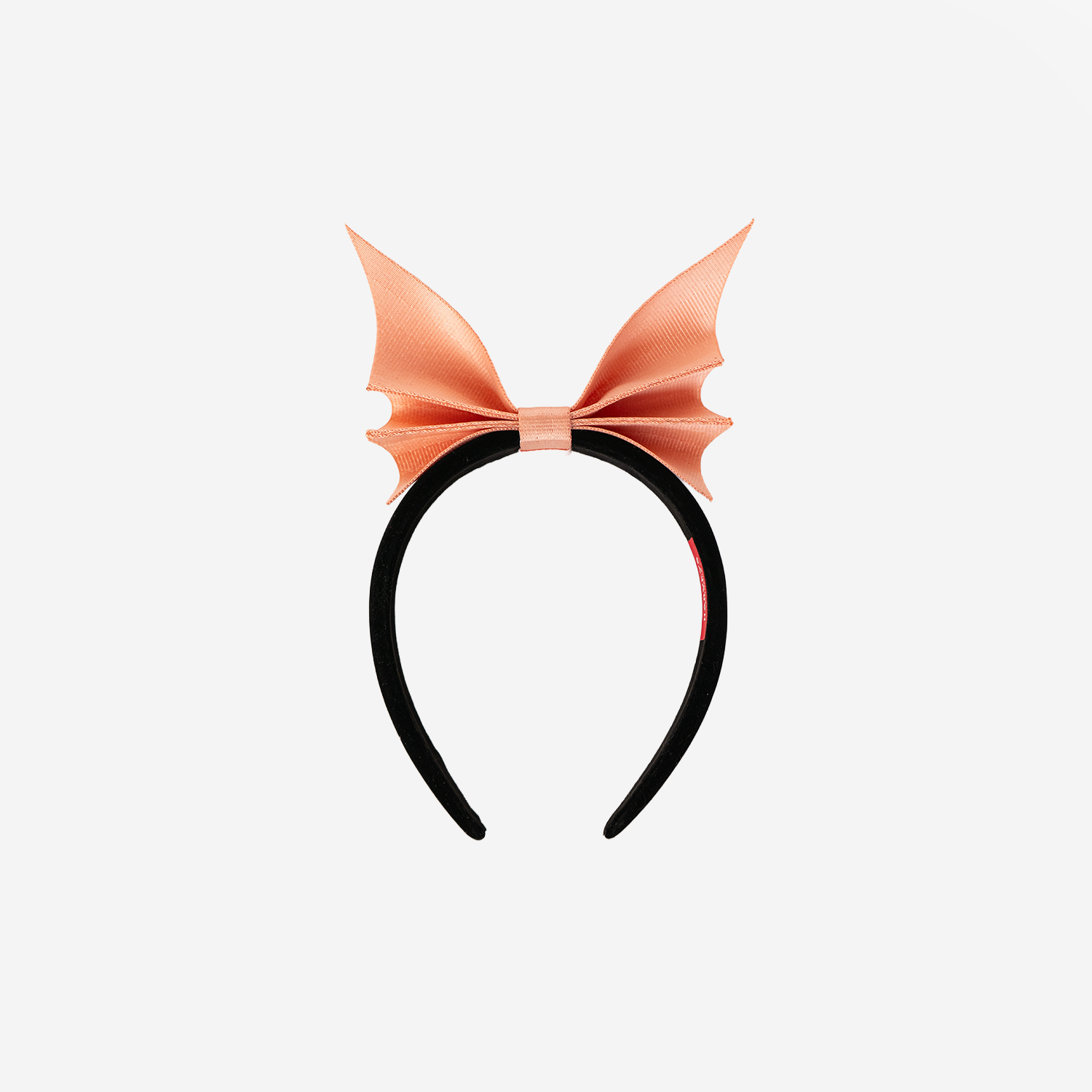 Back view of a Bat Headband in Cantaloupe