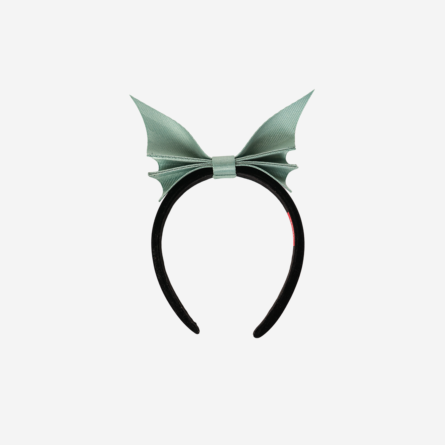 Back view of a Bat Headband in Mint