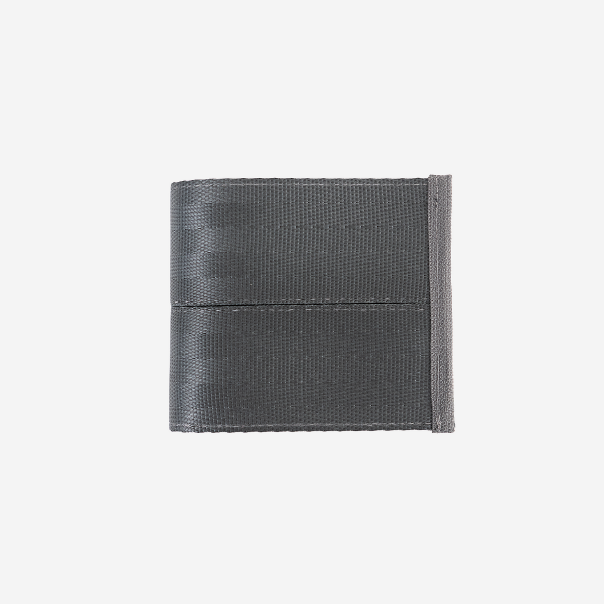 A dark gray billfold wallet made seatbelt, shown closed on a solid light gray background.