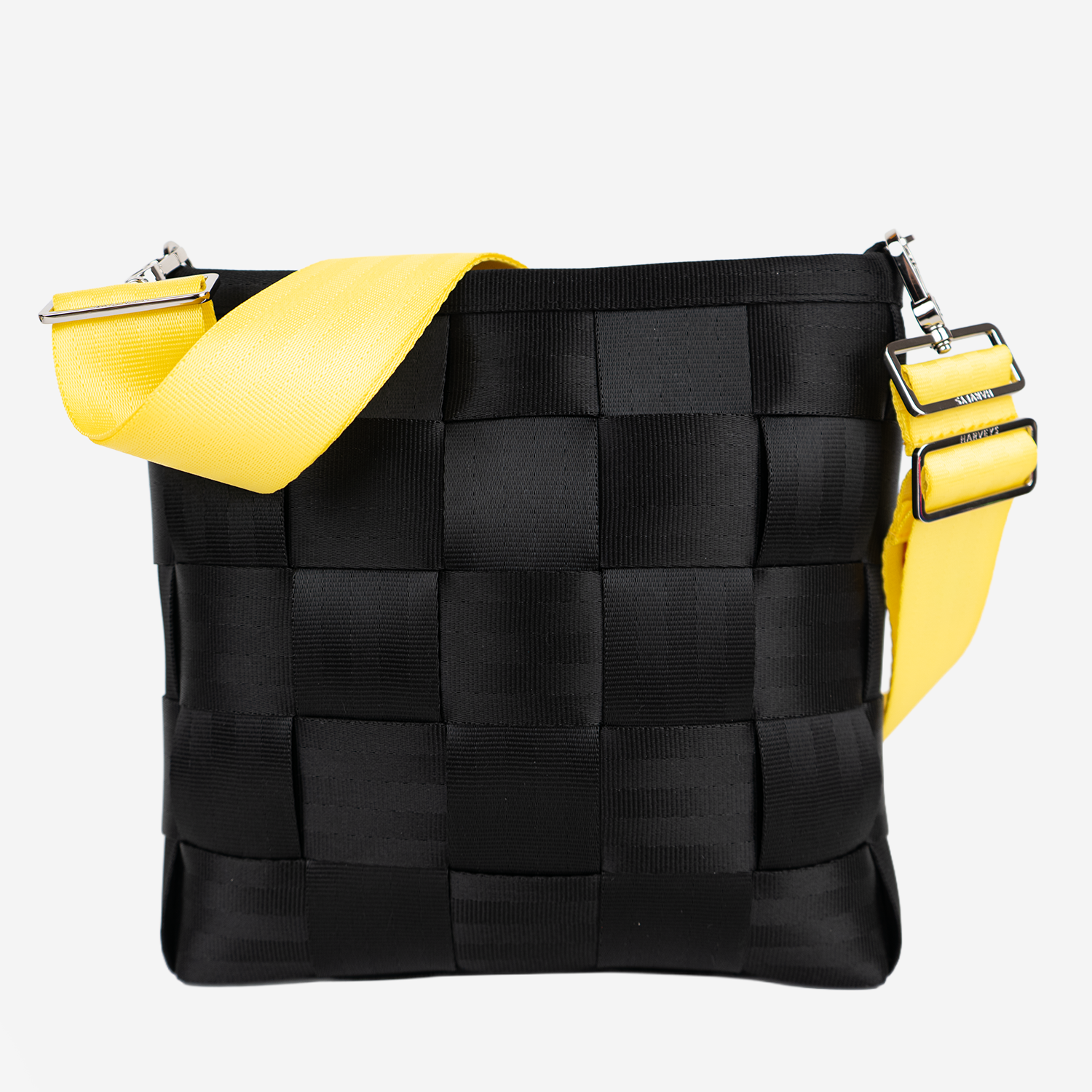 The 5 Panel Click N Carry in Lemon being used on a bag