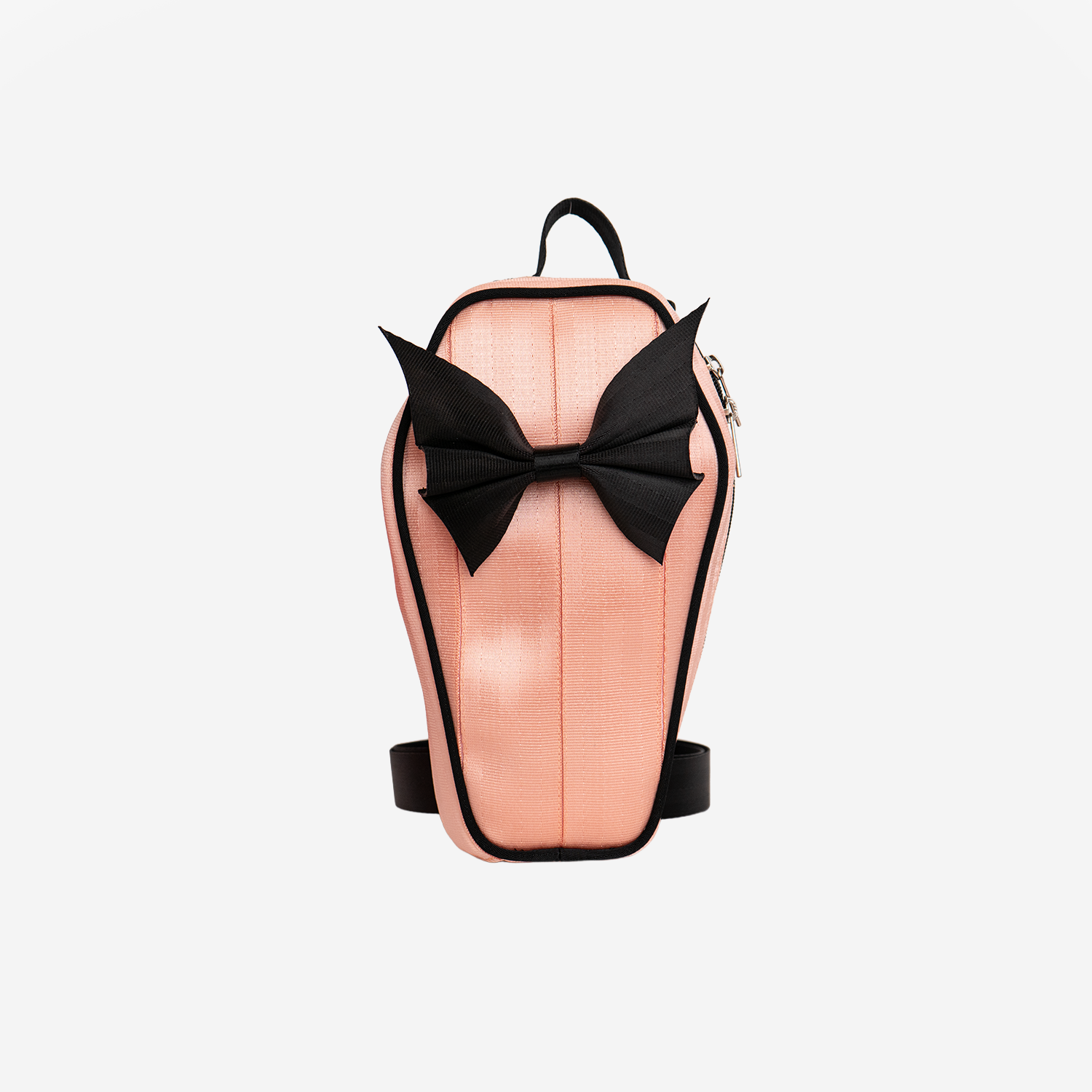 The front of a Coffin Convertible Crossbody in Cantaloupe