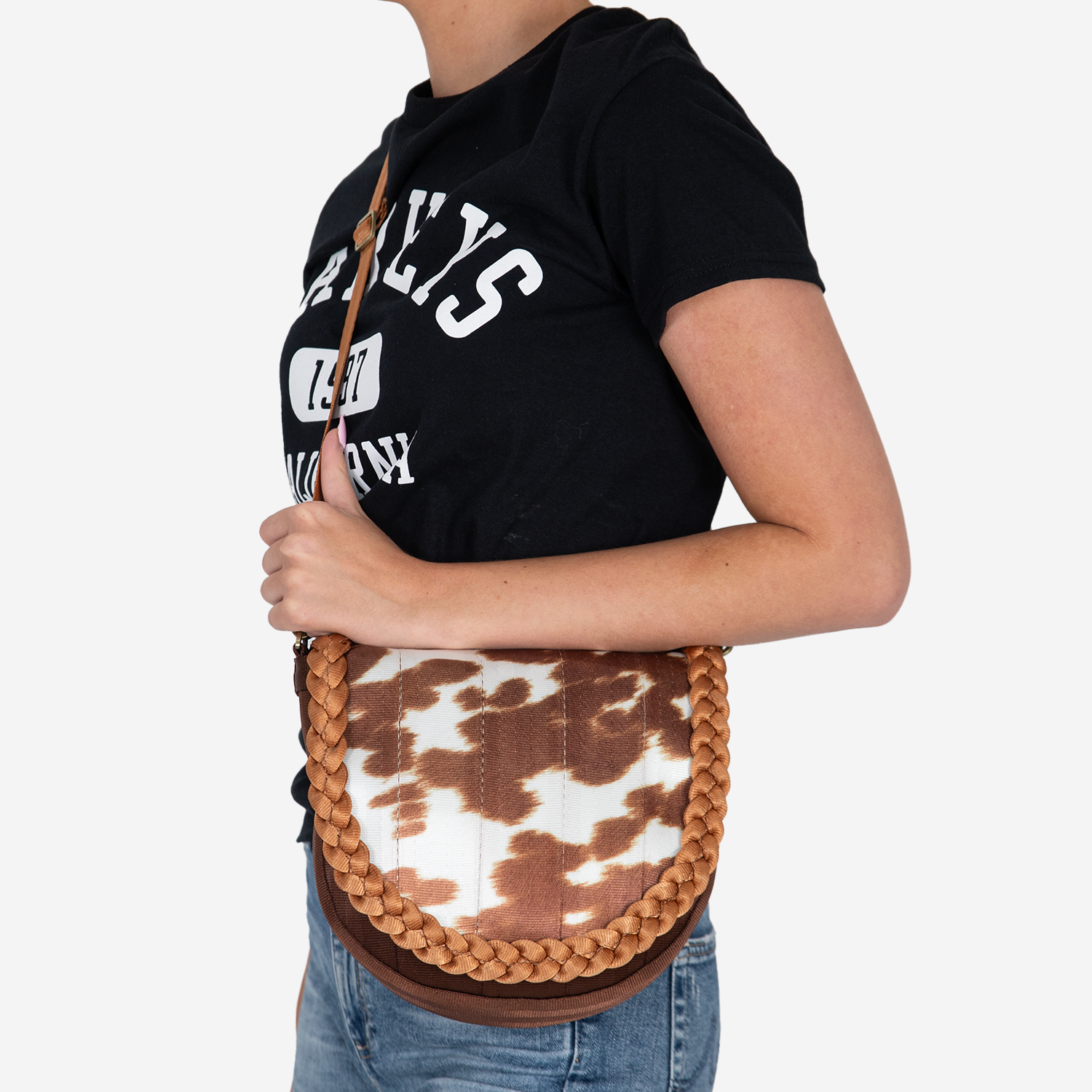 Model view of a Sophia Saddle Bag in Cowgirl being worn crossbody