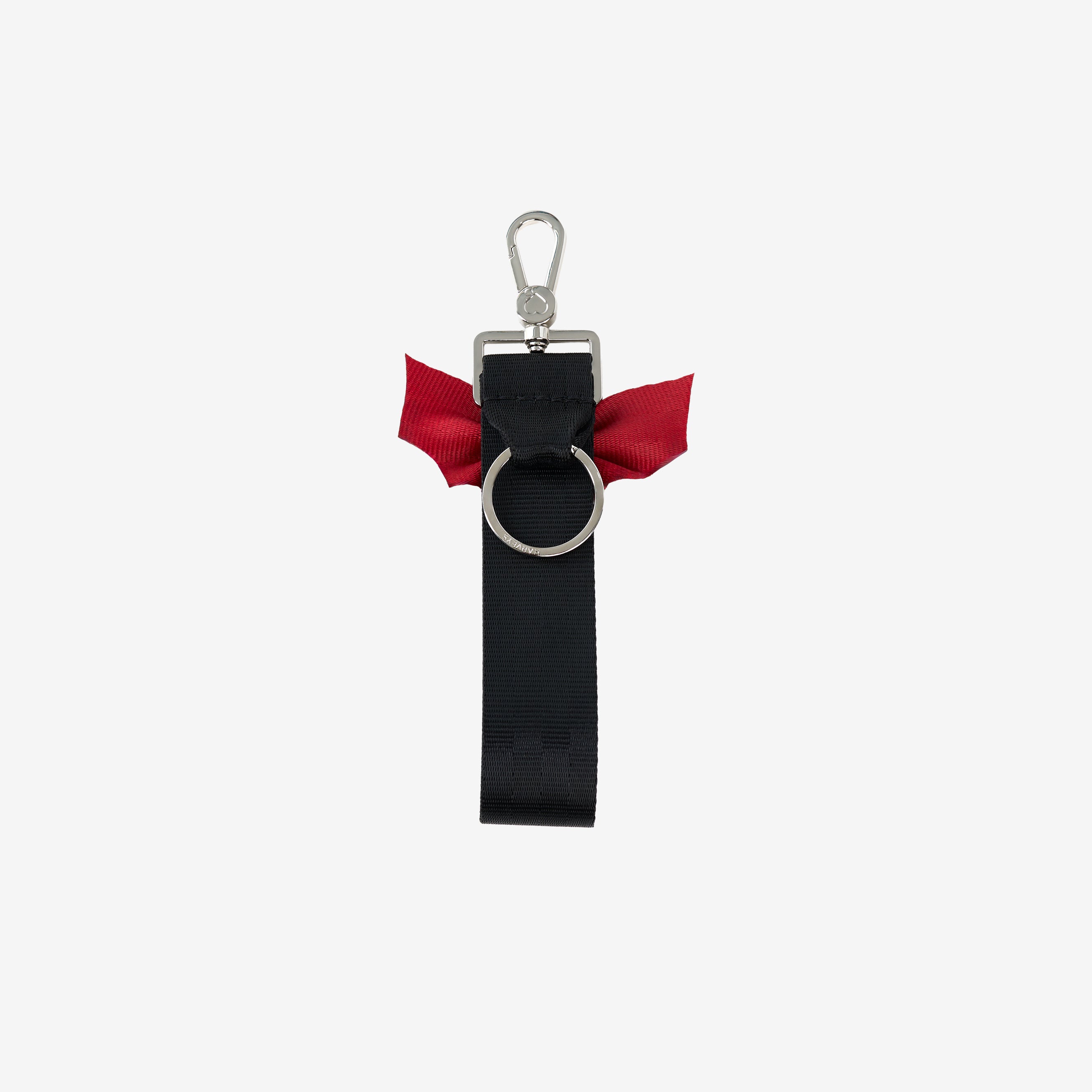 back view of black keychain with red bat shaped bow