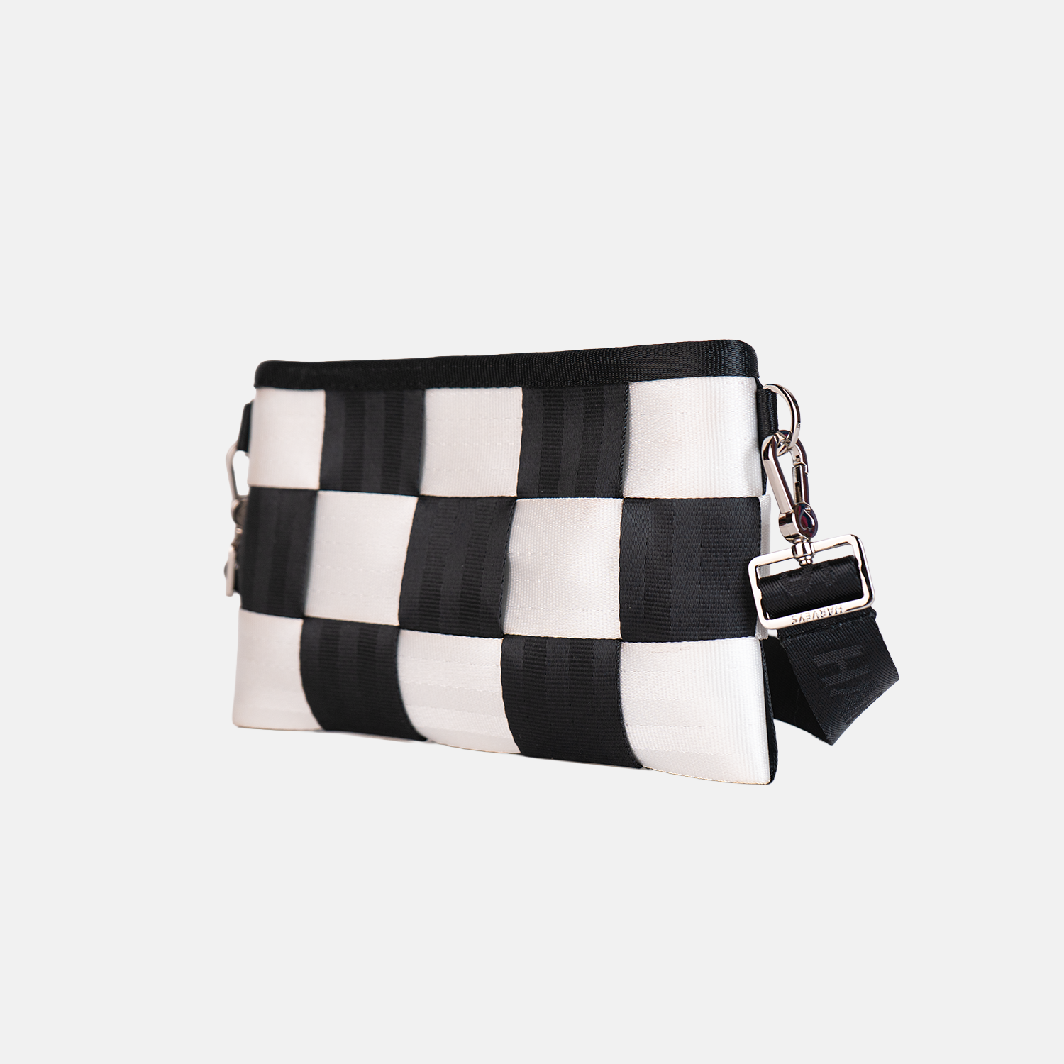 Black and white checkered Hip Pack with a strap on a light gray background