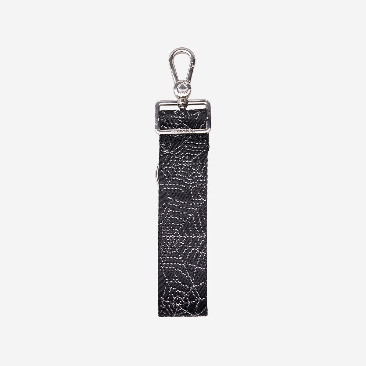 The back of a Black Widow 4 Panel Keychain