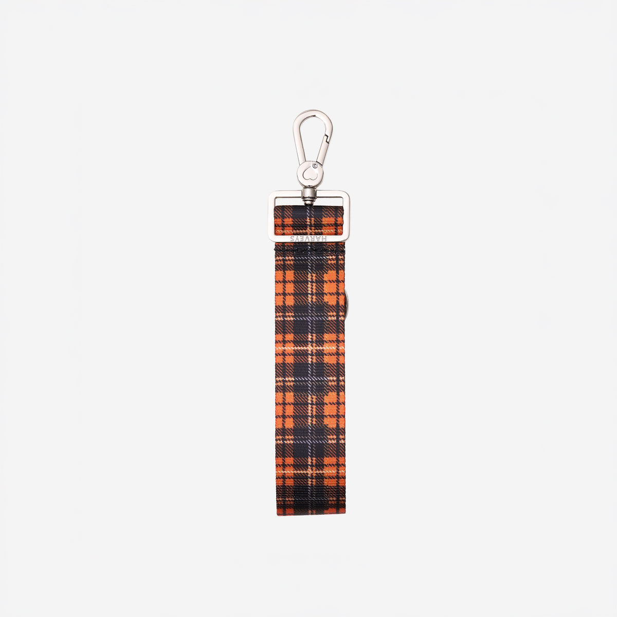 Front view of 4 panel key chain in orange tartan