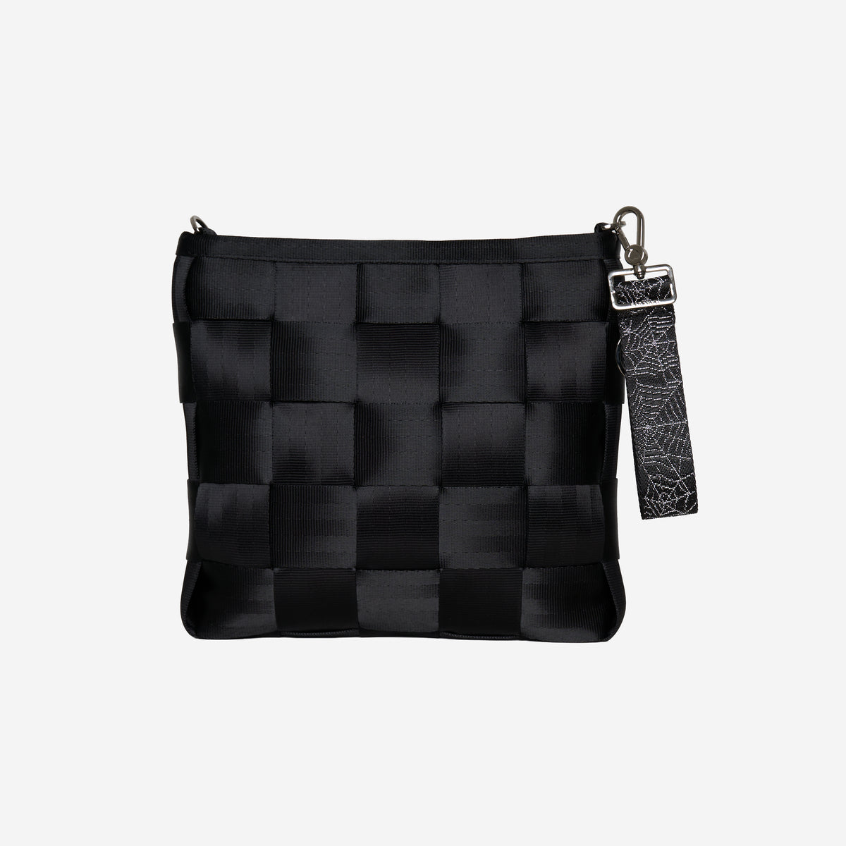 The Black Widow 4 Panel Keychain on a bag