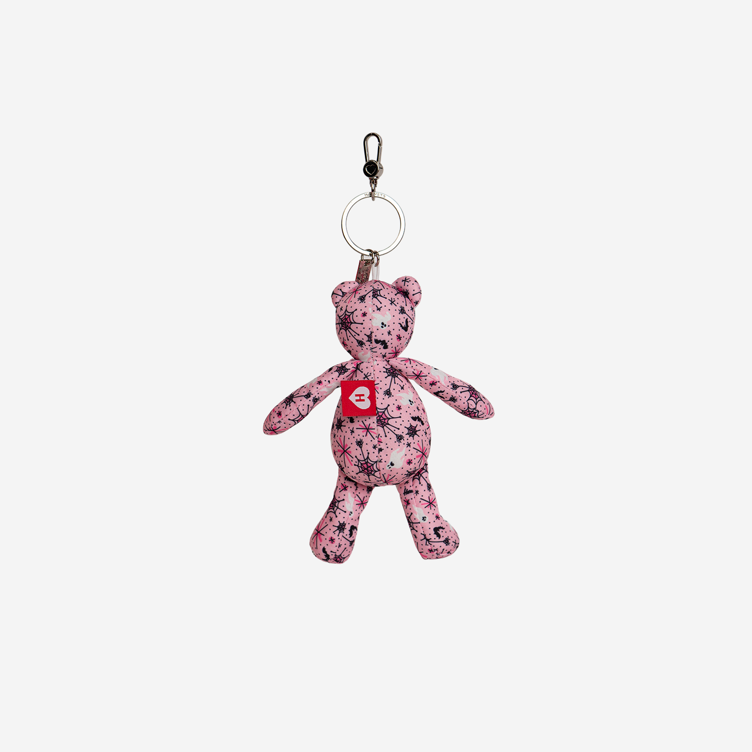 The back of a Cali Bear Key Charm in Pink-A-Boo