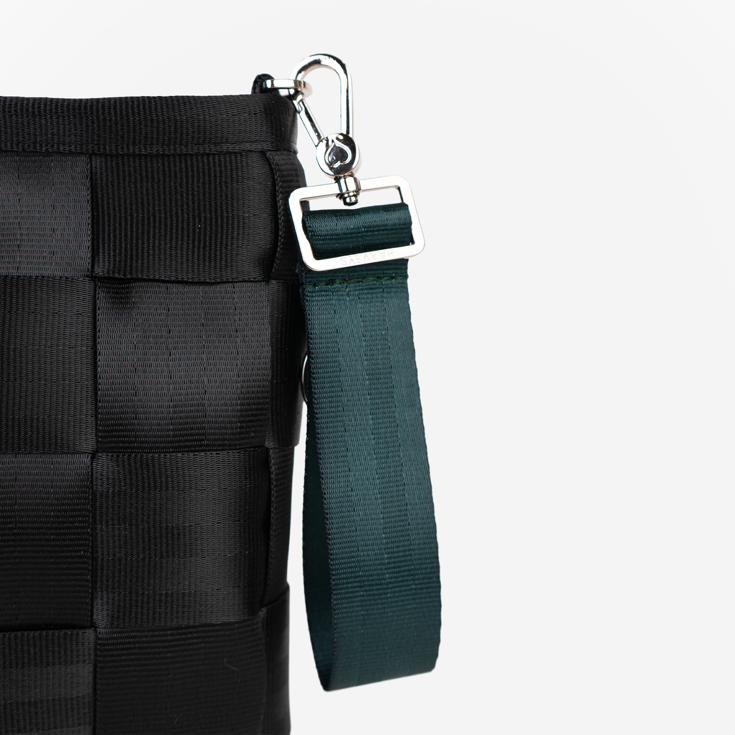 The 4 Panel Keychain in Nori being used on a bag