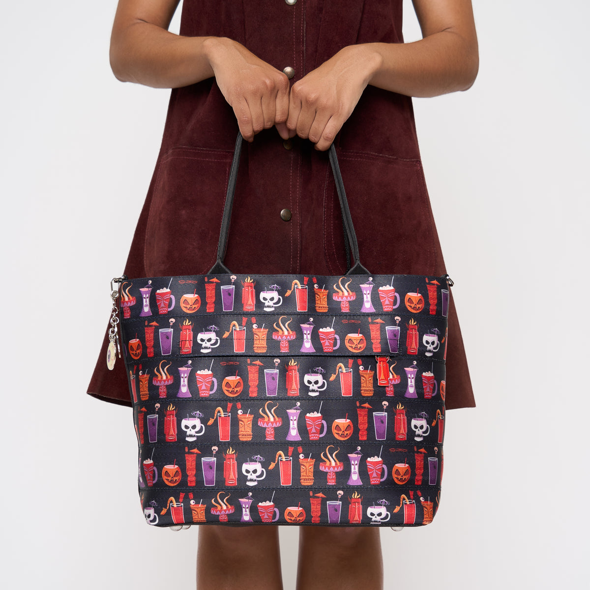 Model holding Medium Streamline Tote Shag Spooky Tiki Cocktail
