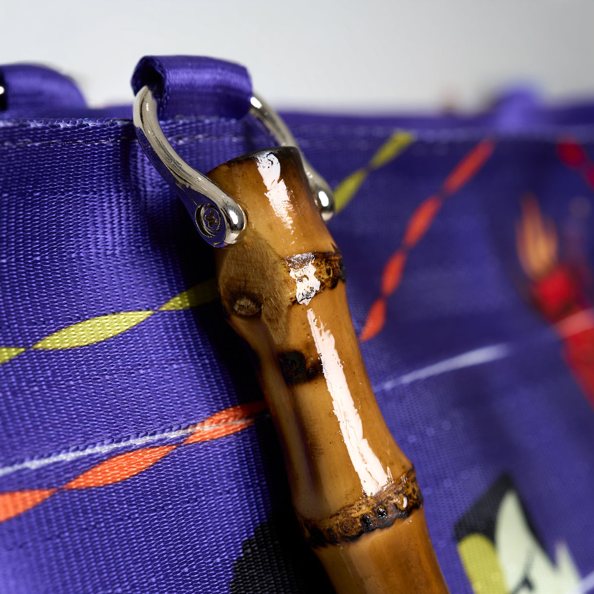 Close up of real bamboo handles on Mini Streamline Tote Shag Tiki Dance Party