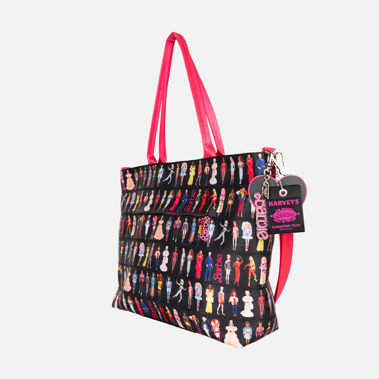 The side view of the Barbie Through The Eras Medium Streamline Tote