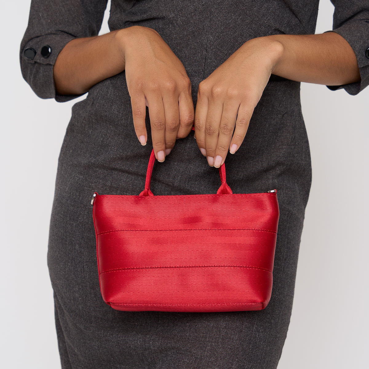 A model wearing the Scarlet Petite Tote