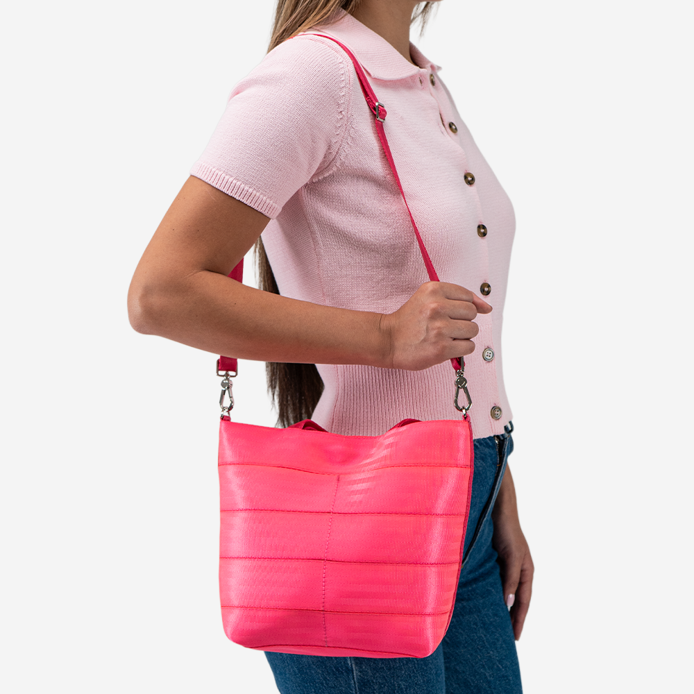 The Rosie Tote in Dragonfruit being worn by a model