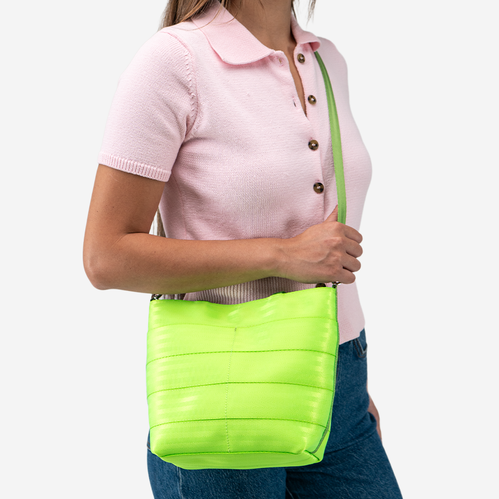 The Rosie Tote in Lime being worn by a model