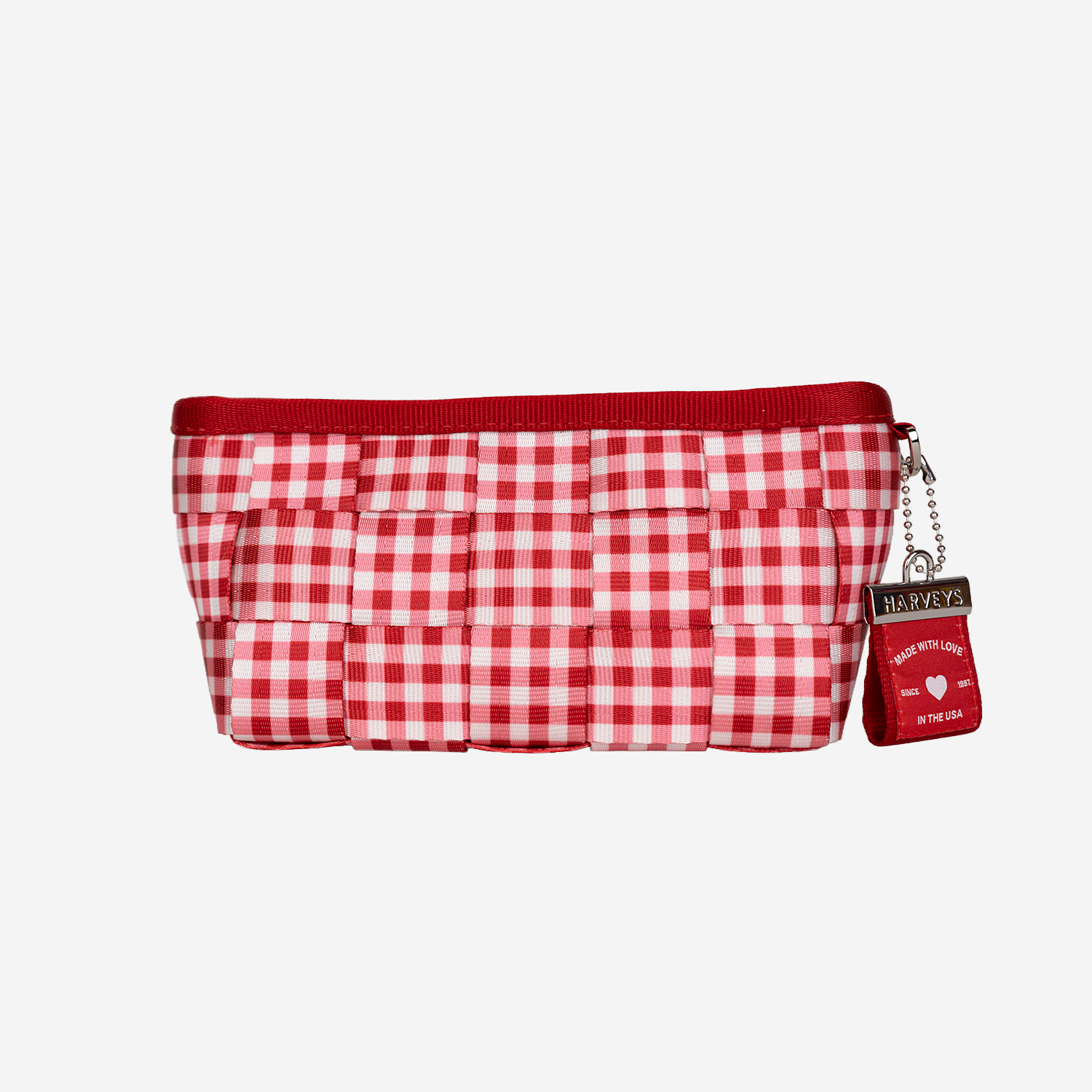 The front of a Triangle Makeup Case in Red Gingham