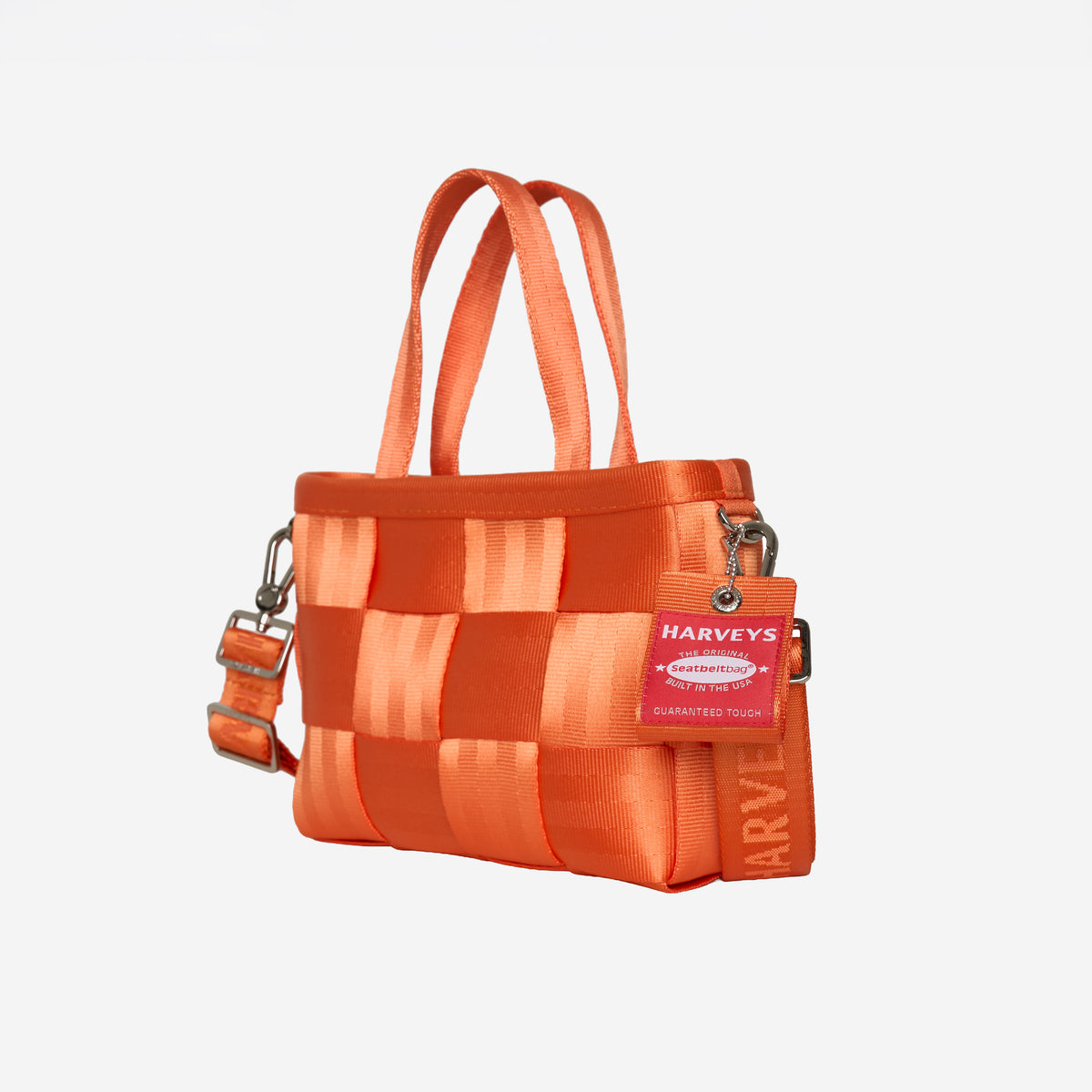 Front/side view of woven petite tote orange