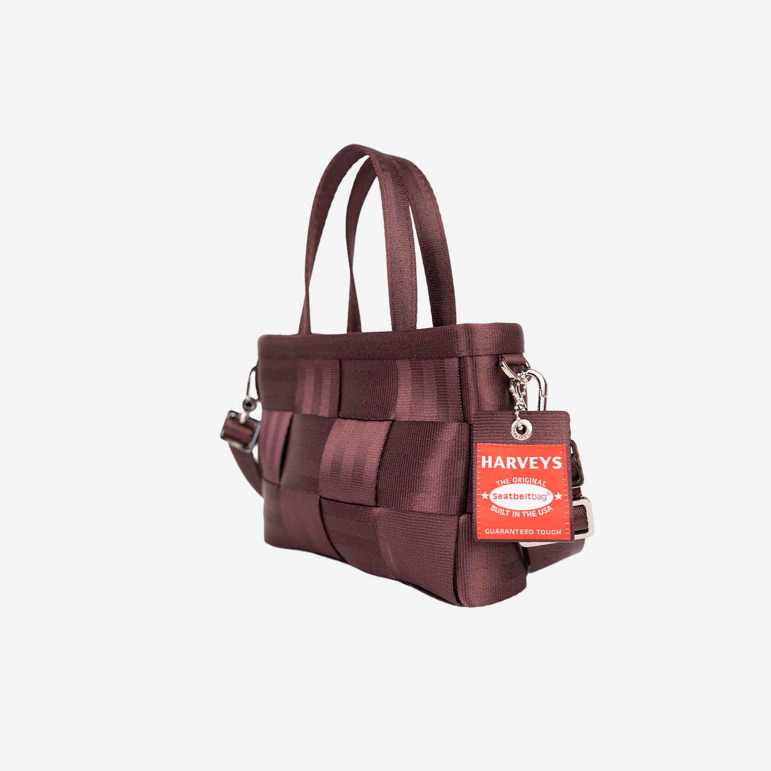 The side view of the Woven Petite Tote in Merlot