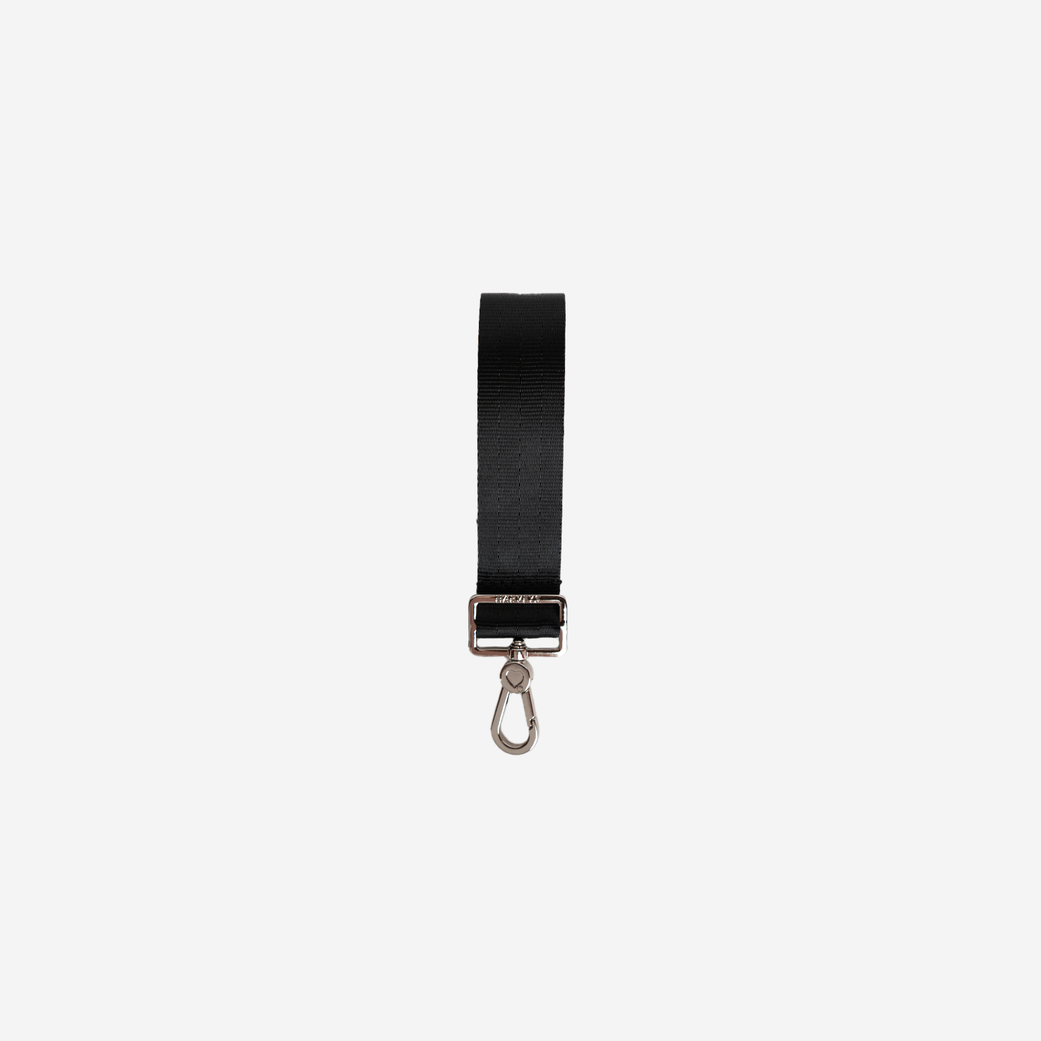 The back of a black 4 panel keychain