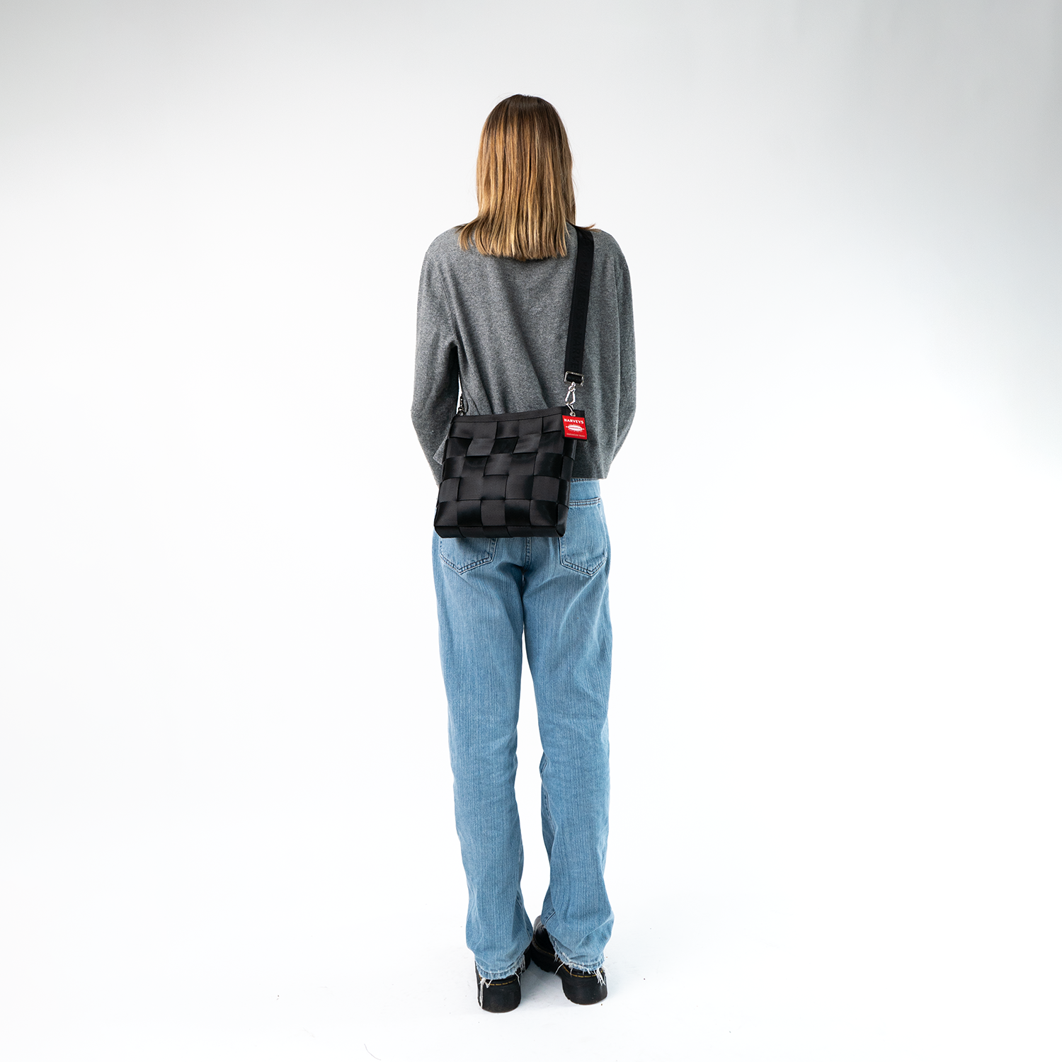 A Mini Messenger in Black being worn by a model