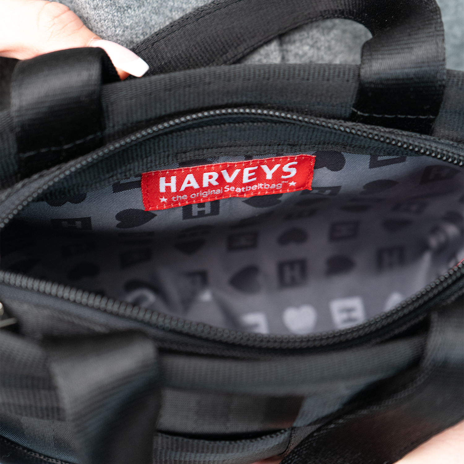 The inside of a Woven Petite Tote in Black