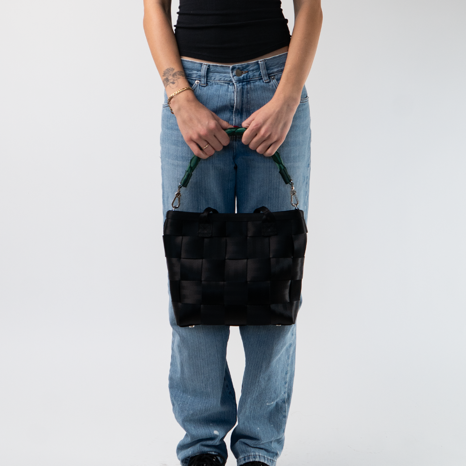A Forest Lola Click N Carry being used by a model