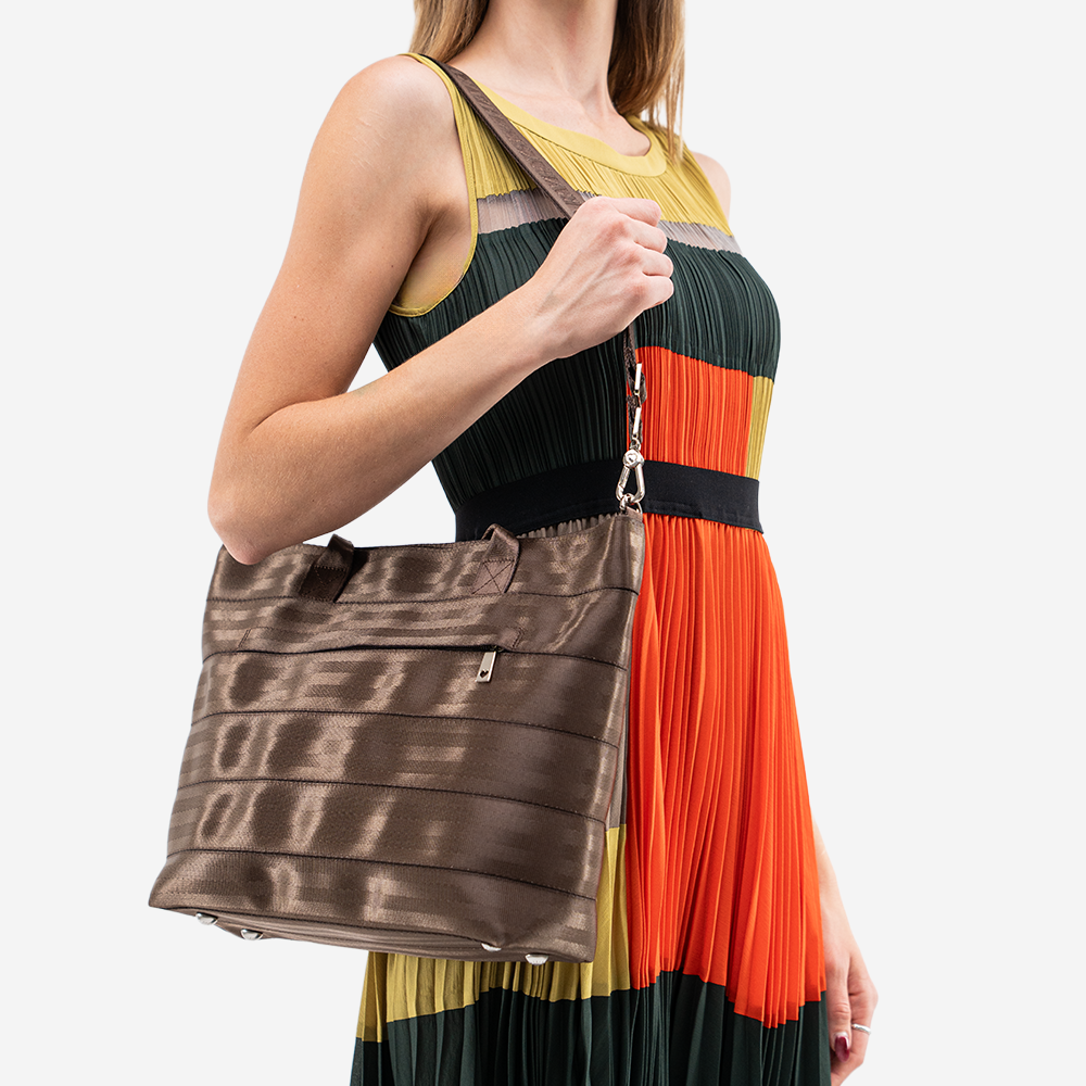 The Medium Streamline Tote in Espresso being worn by a model
