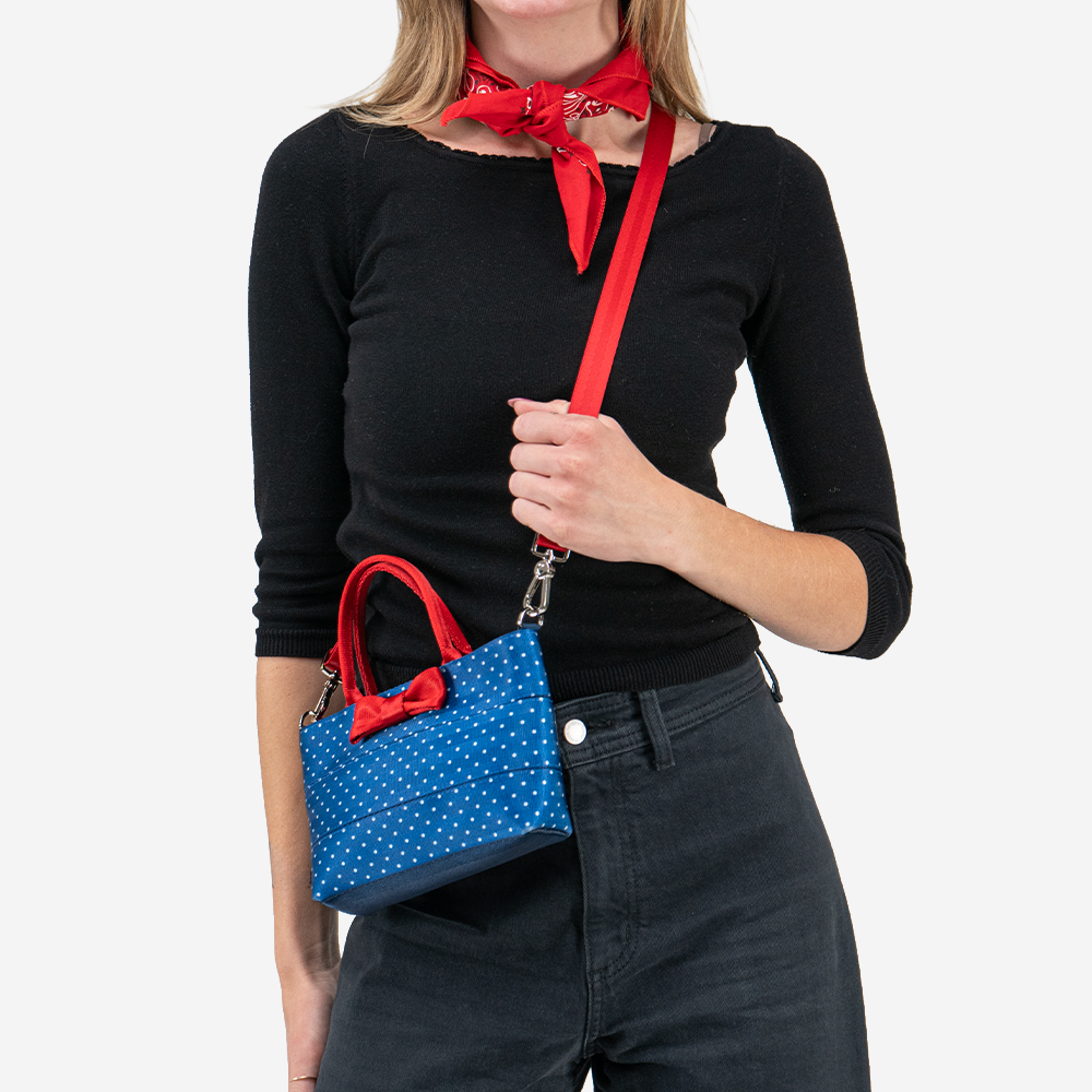 The Scarlet and Blue Dottie Petite Tote being worn by a model