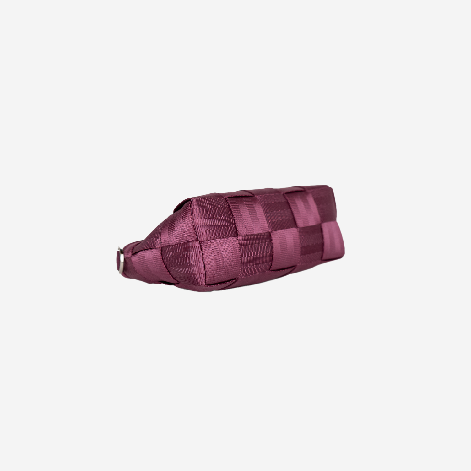 The bottom of a Plum Triangle Makeup Case