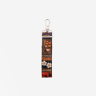 The back view of a Shag Tiki Tapa 4 Panel Keychain