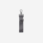 A dark gray seatbelt keychain with a silver metal swivel snap hook and a matching silver metal D-ring, shown against a plain light gray background.