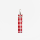 The back of a 4 Panel Keychain in Red Gingham