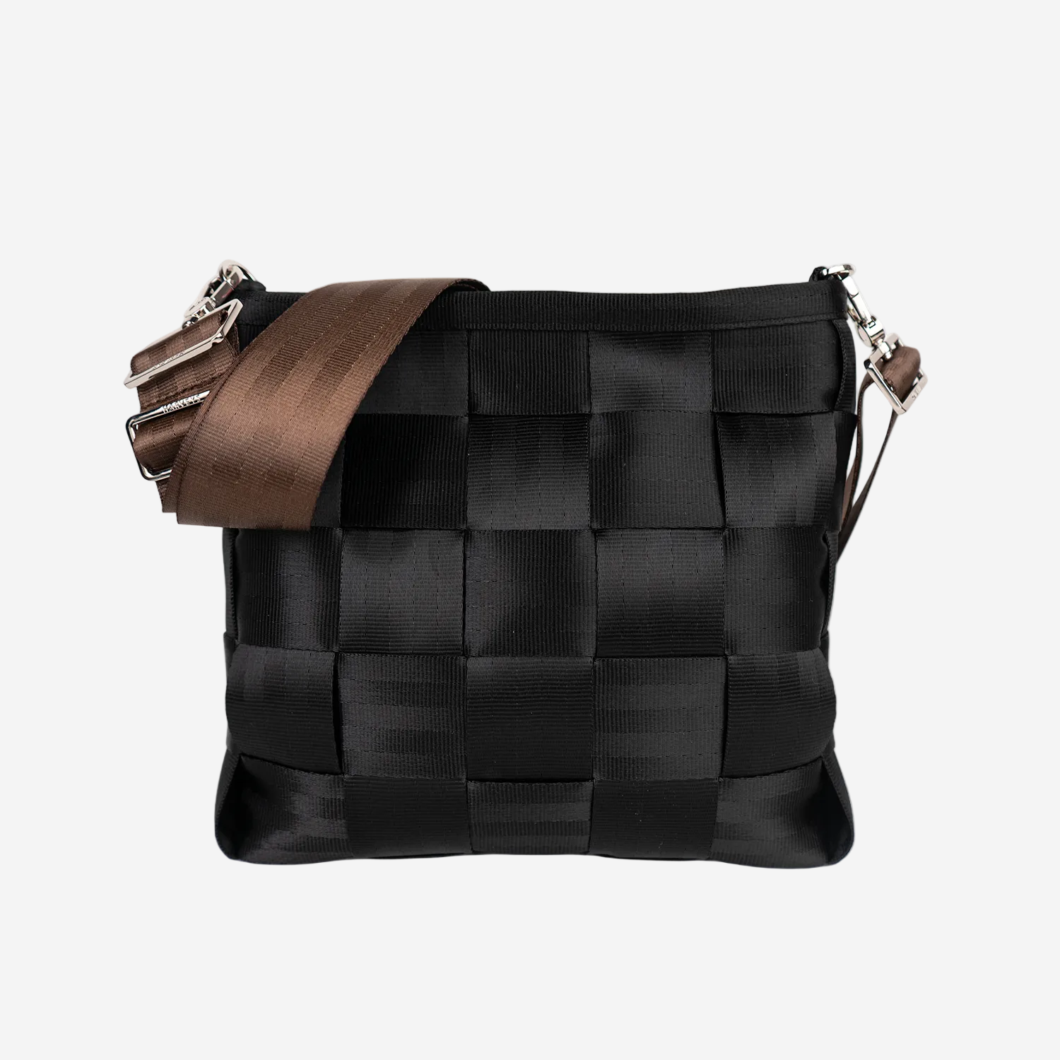 The 5 Panel Click N Carry in Espresso being used on a bag