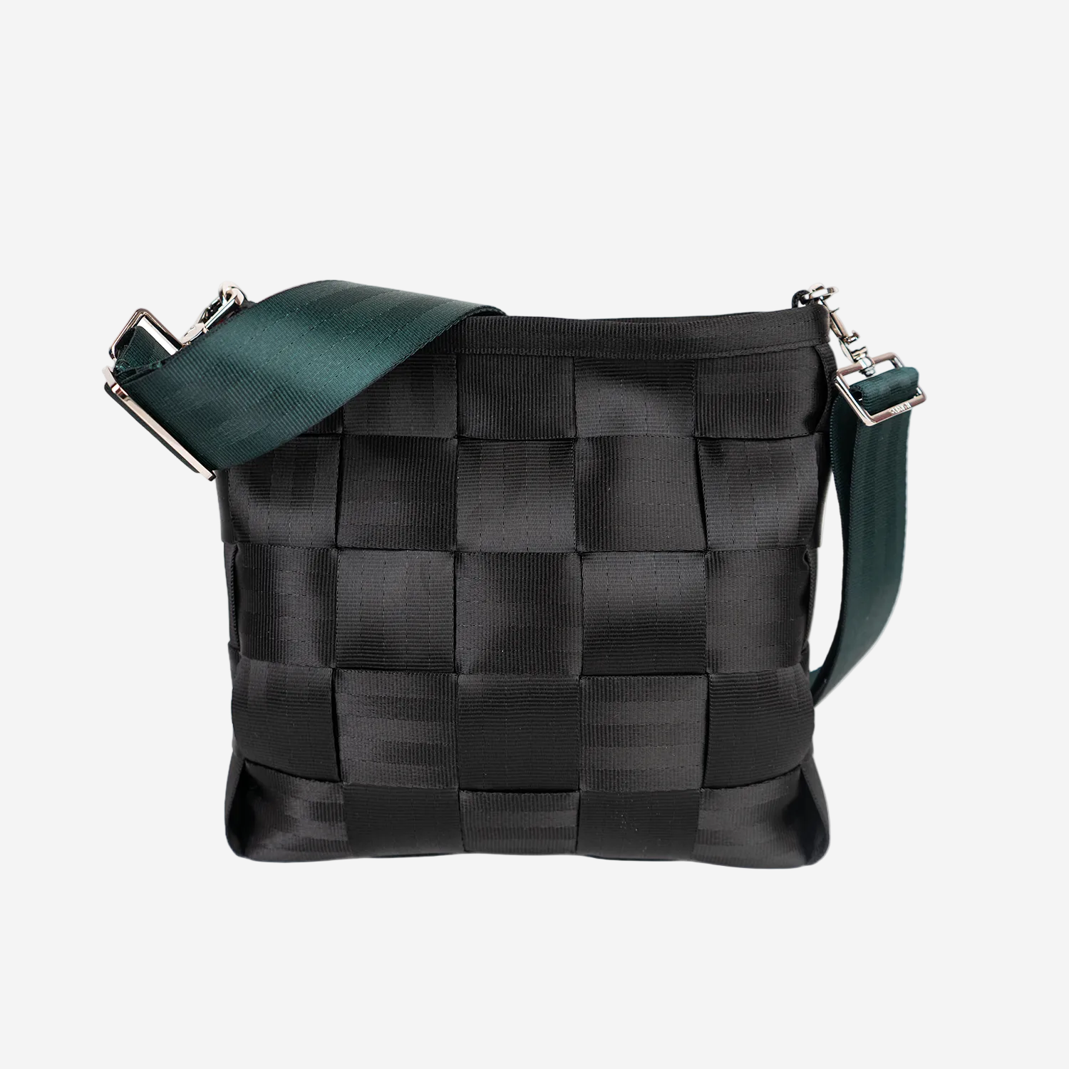 The 5 Panel Click N Carry in Nori being used on a bag