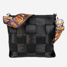 The Shag Tiki Tapa 5 Panel Click N Carry being used on a bag