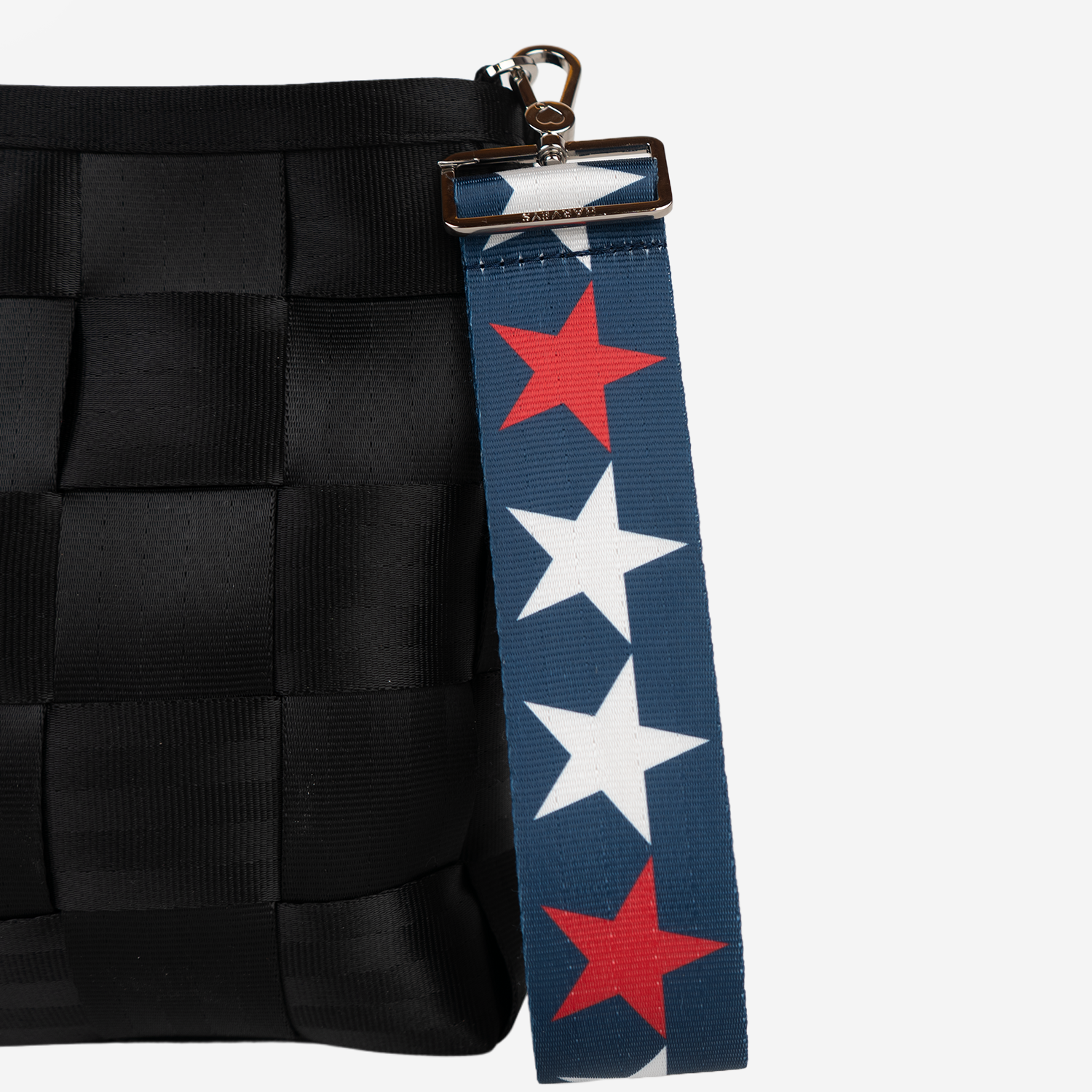 The RWB Stars 5 Panel Keychain being used on a bag