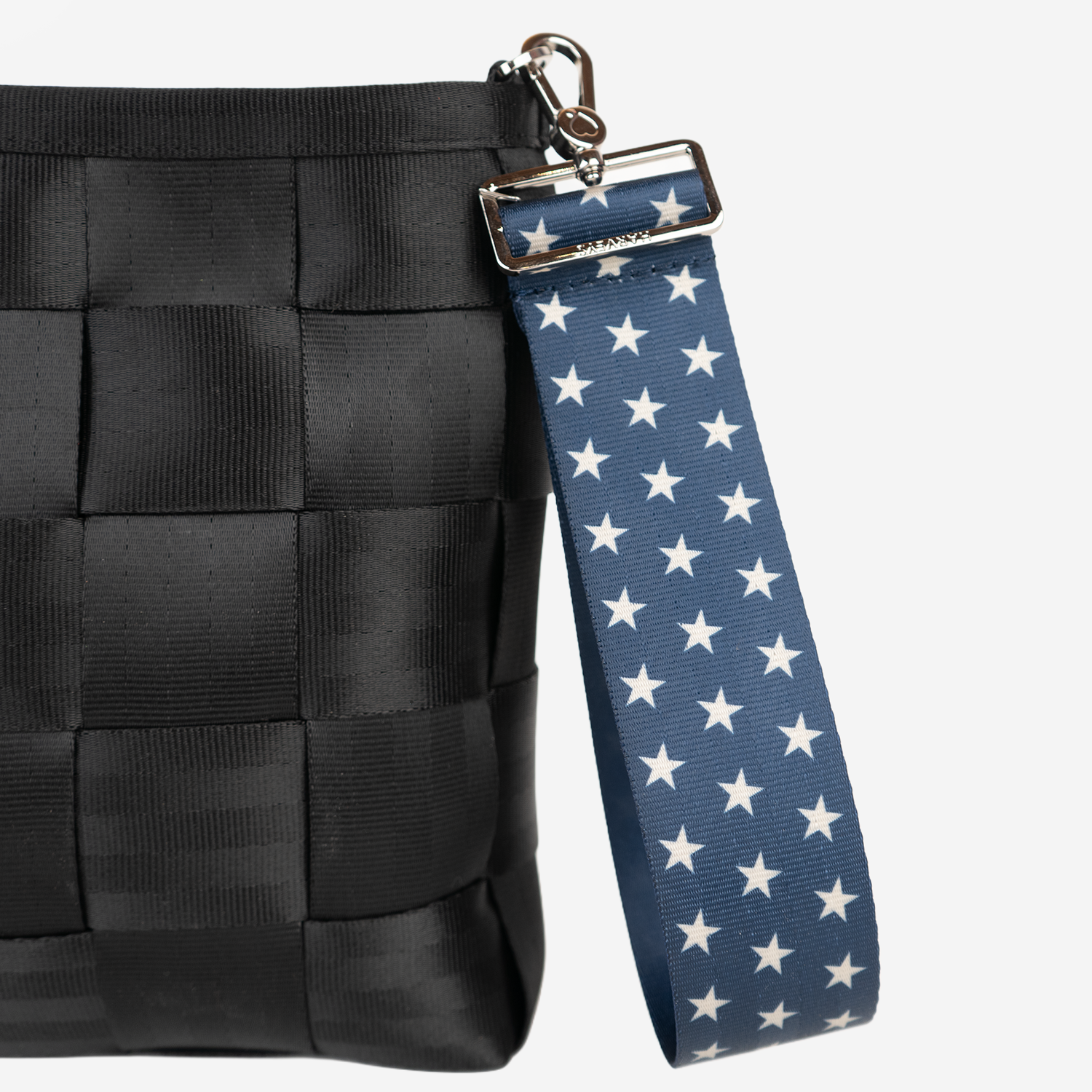 The a Stars 5 Panel Keychain being used on a bag