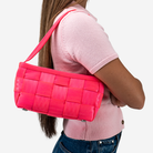The Baguette in Dragonfruit being worn by a model