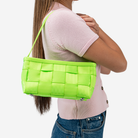 The Baguette in Lime being worn by a model