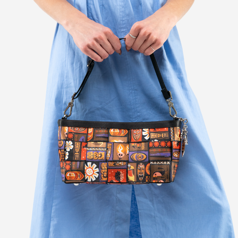 The Shag Tiki Tapa Baguette being held by a model