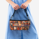 The Shag Tiki Tapa Baguette being held by a model