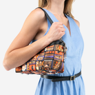 The Shag Tiki Tapa Baguette being worn by a model