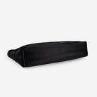 Black makeip pouch on a white background showing bottom of bag