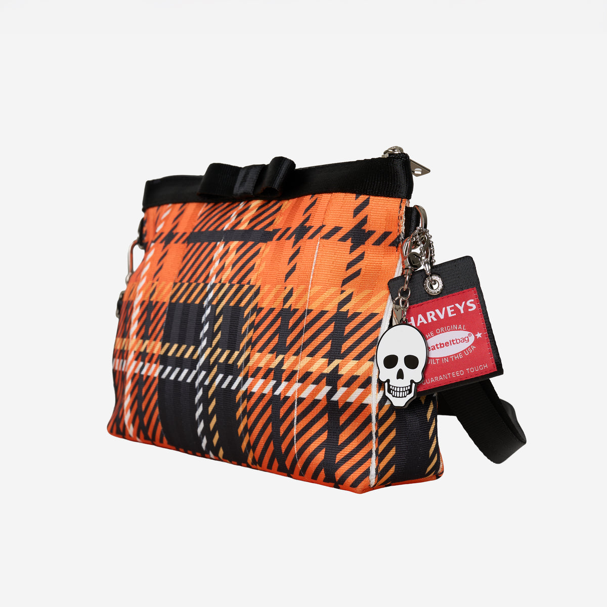 Front/side view of Bow Clutch in orange tartan